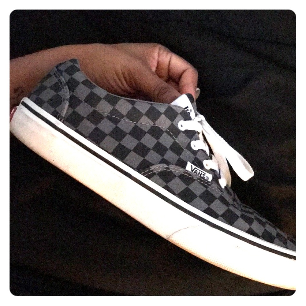Black, gray, and white checkered VANS
